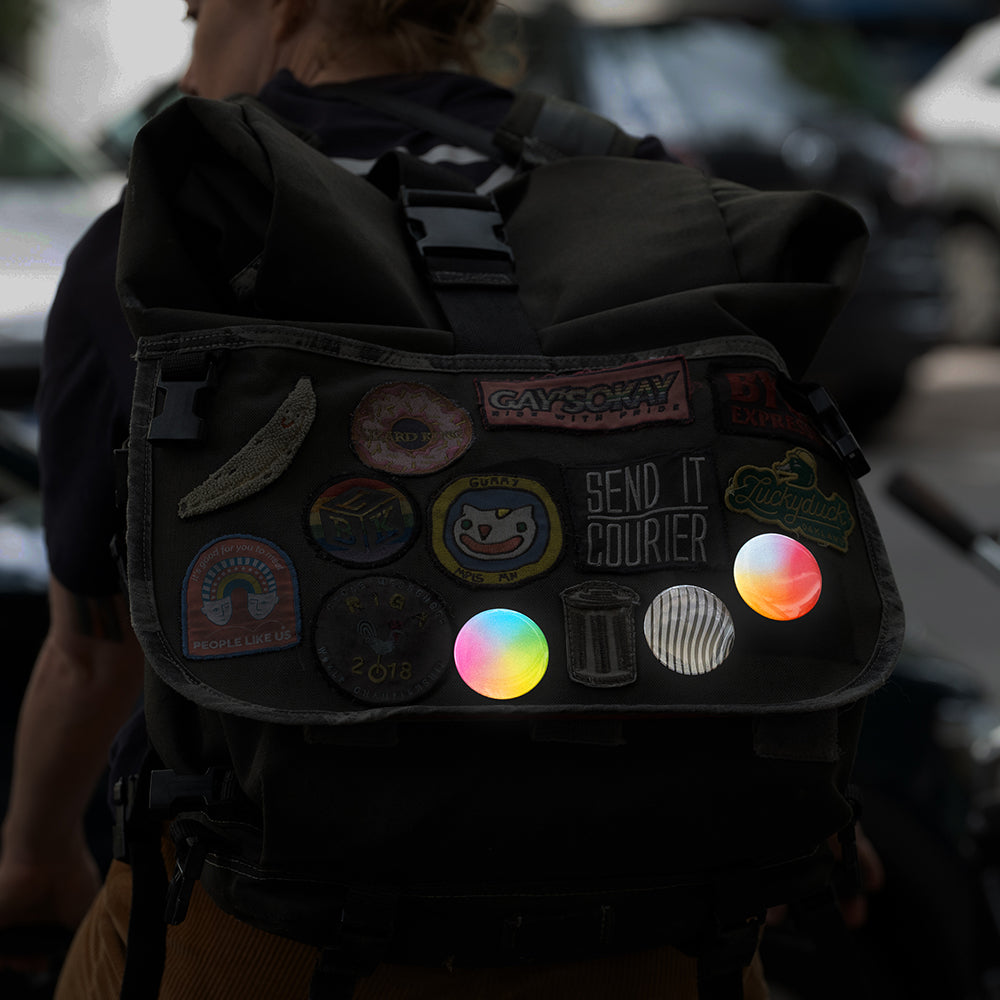 courier woman riding bike with backpack