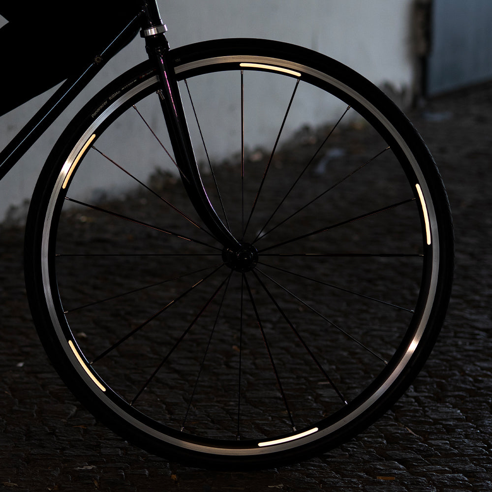 reflective rim sickers from the strpe set on bicycle with reflection