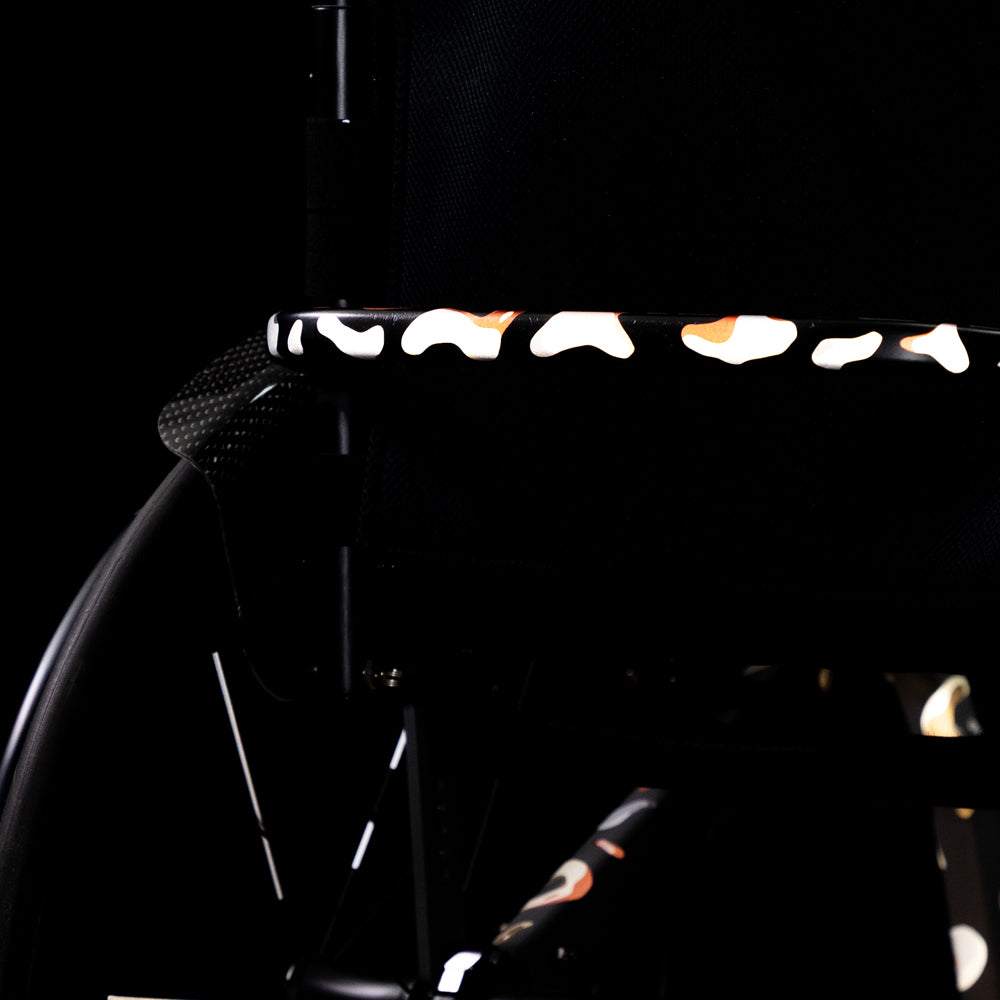 Reflective sticker set pebbles with reflection on back of wheelchair