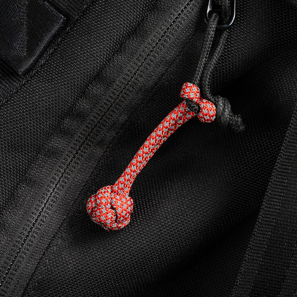 macro picture of loop reflective product on backpack zipper