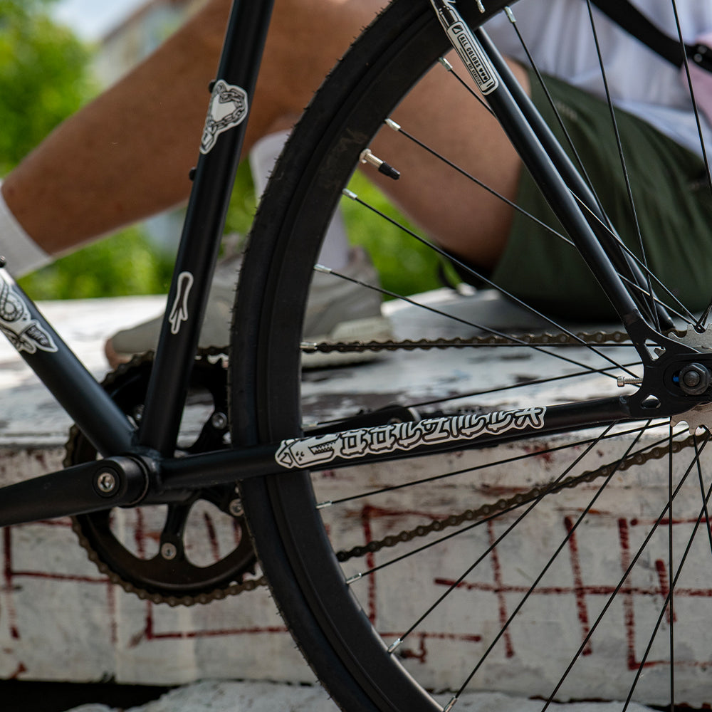 reflective sticker set from artist MrP on black bicycle