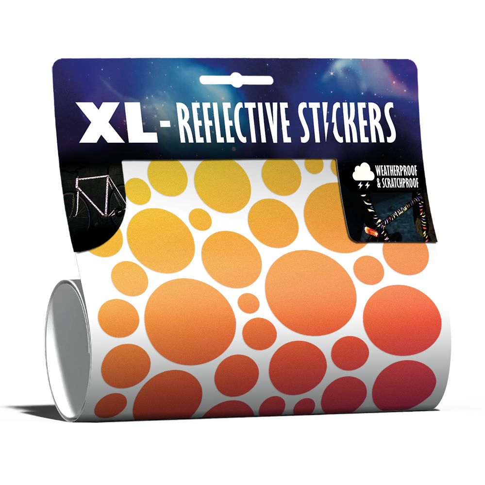 XL Bubbles in Rainbow-Farbe von REFLECTIVE Berlin als verpacktes Set mit stark reflektierenden bunten Kreisen für mehr Sichtbarkeit im urbanen Stil.