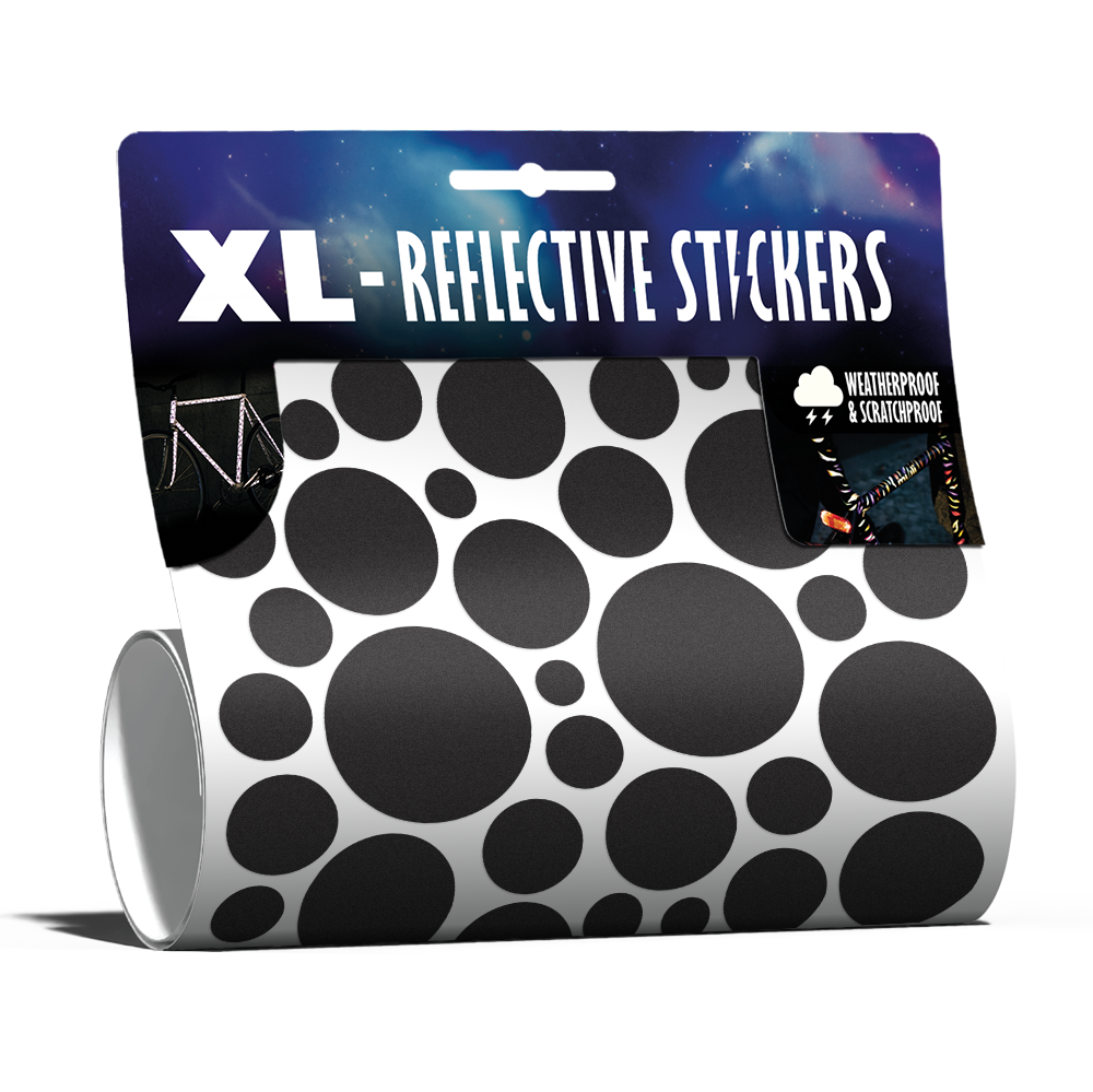 XL Bubbles in Schwarz von REFLECTIVE Berlin als verpacktes Set mit stark reflektierenden Kreisen für mehr Sichtbarkeit im urbanen Stil.