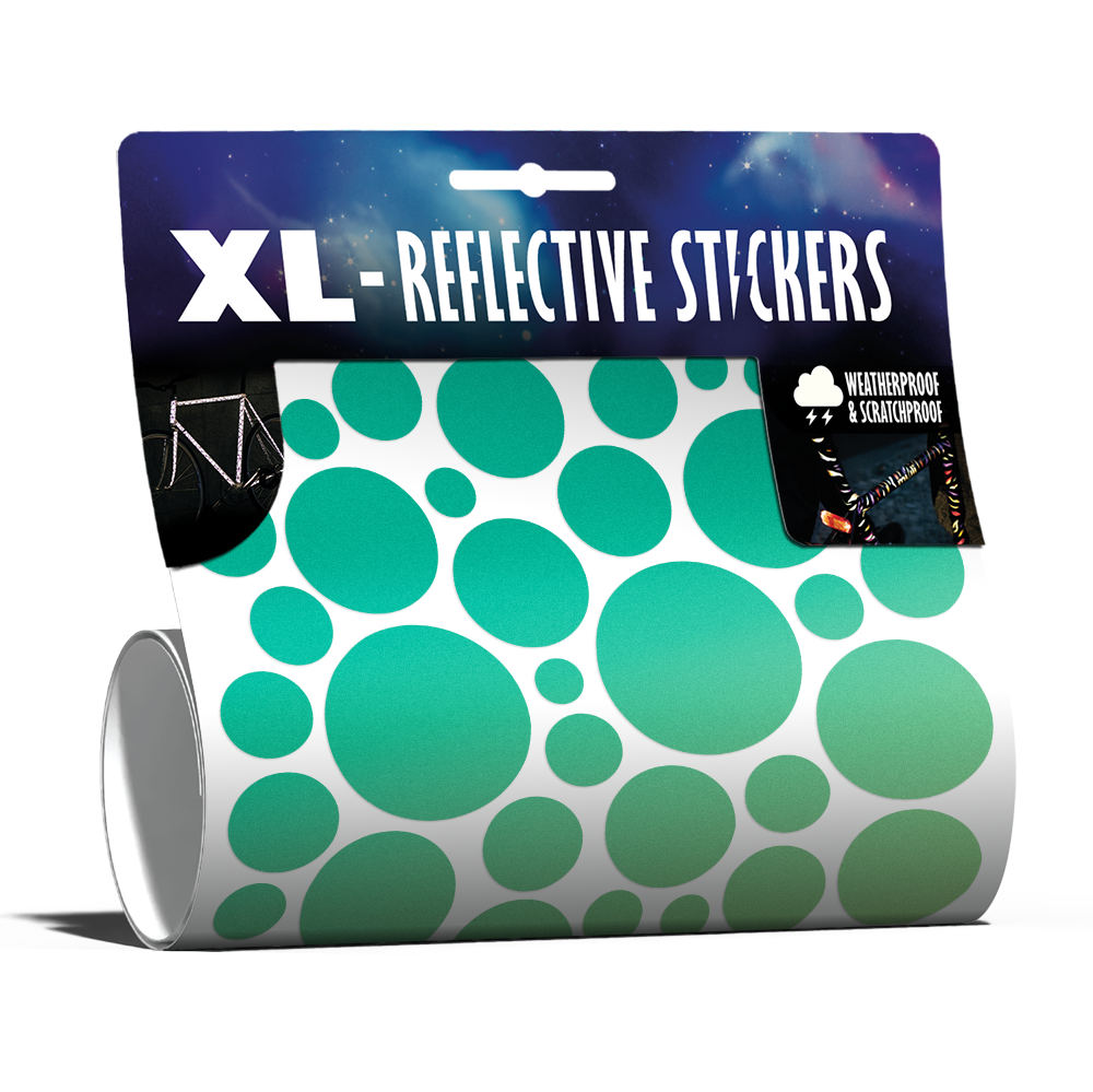 XL Bubbles in Grüntönen von REFLECTIVE Berlin als verpacktes Set mit stark reflektierenden Kreisen für mehr Sichtbarkeit im urbanen Stil.