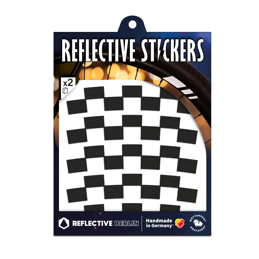 Reflektierender Felgen Aufkleber „Checker“ in Farbvariante „schwarz“ in Größe 20mm in Produktverpackung von REFLECTIVE Berlin.