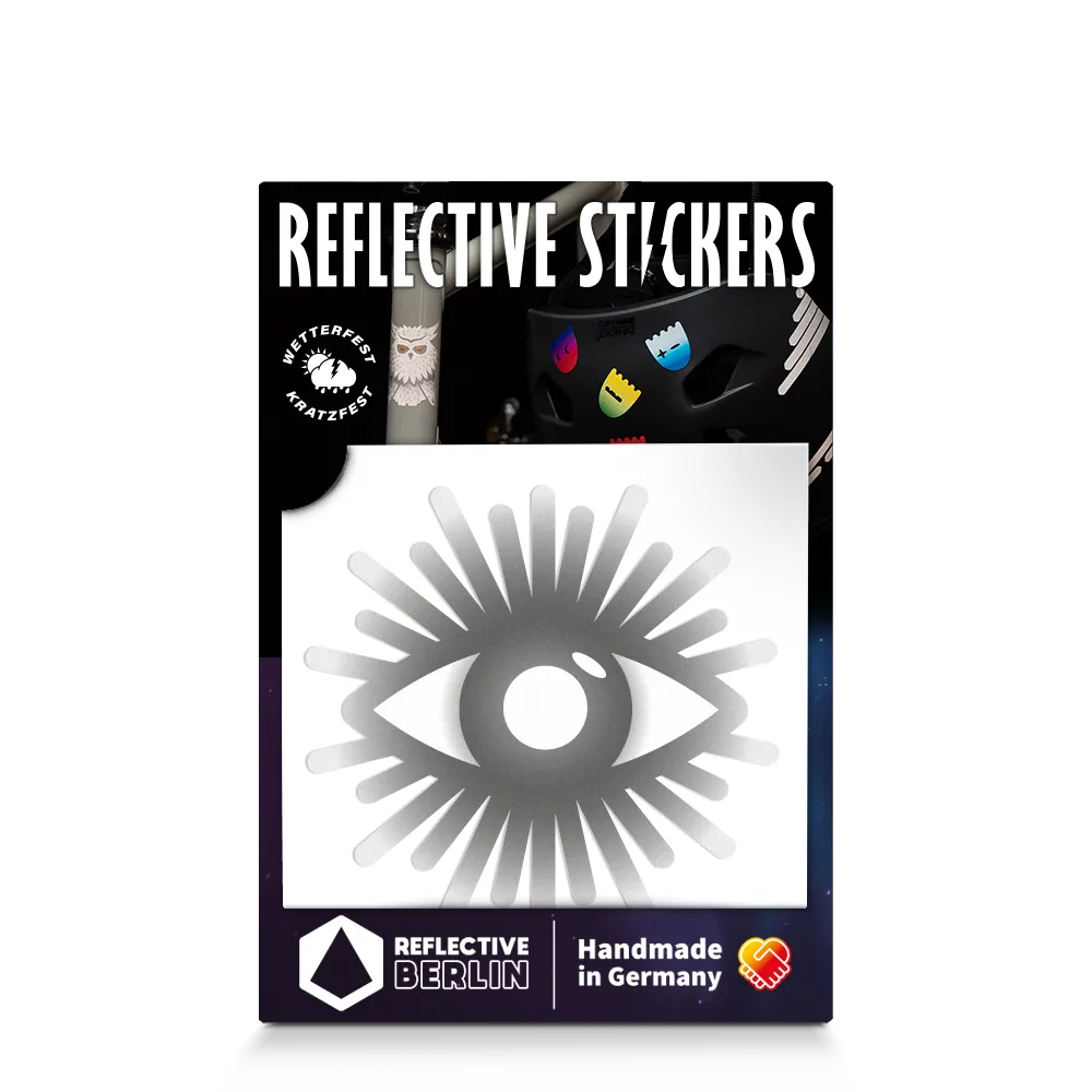Reflektierender Aufkleber „Auge“ in Farbvariante „grau“ in Produktverpackung von REFLECTIVE Berlin.