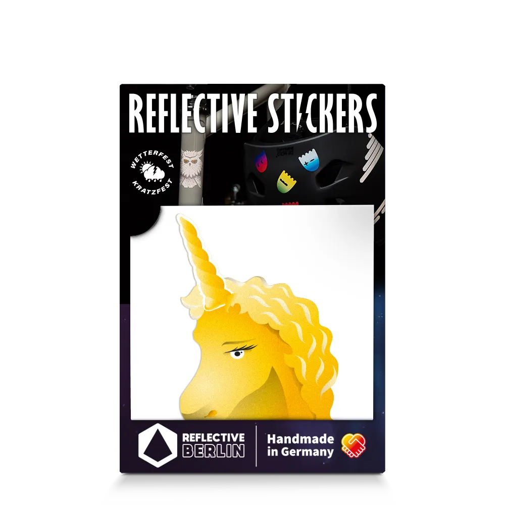 Reflektierender Aufkleber „Einhorn“ in Farbvariante „gold“ in Produktverpackung von REFLECTIVE Berlin.