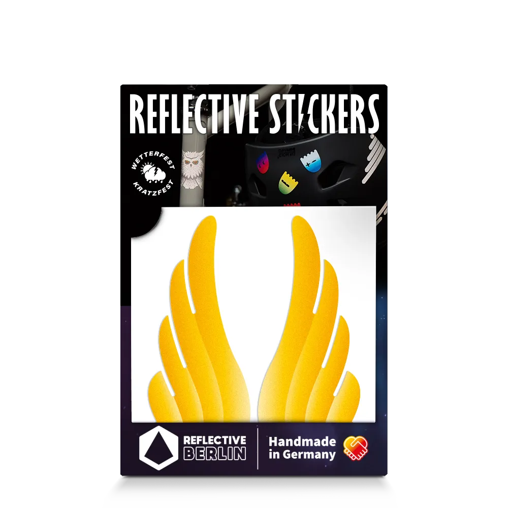 Reflektierender Aufkleber „Flügel“ in Farbvariante „gold“ in Produktverpackung von REFLECTIVE Berlin.