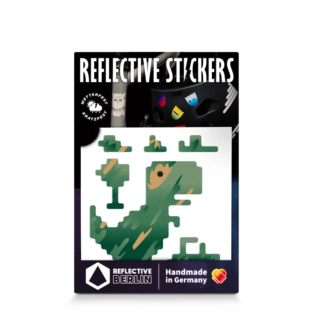 Reflektierender Aufkleber „T-Rex“ in Farbvariante „camo“ in Produktverpackung von REFLECTIVE Berlin.
