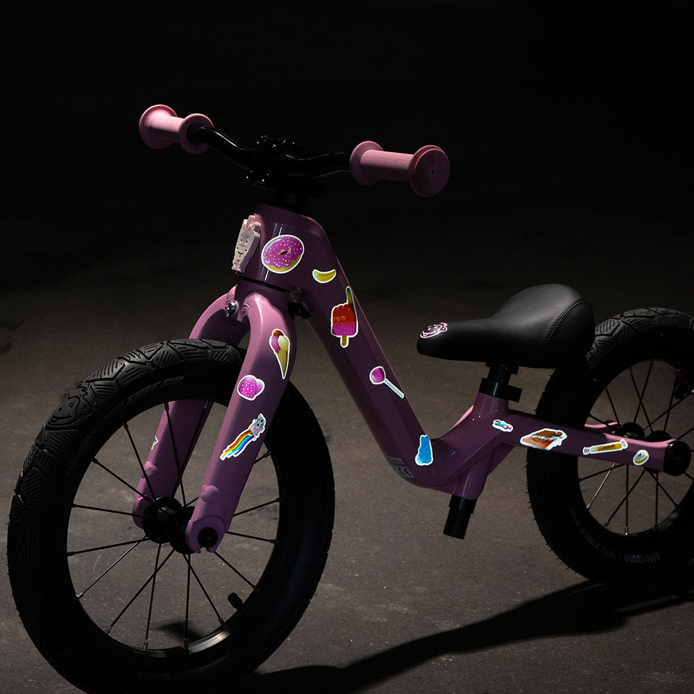 Reflective sweets sticker on a kids bike with reflection