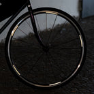 reflective rim sickers from the strpe set on bicycle with reflection
