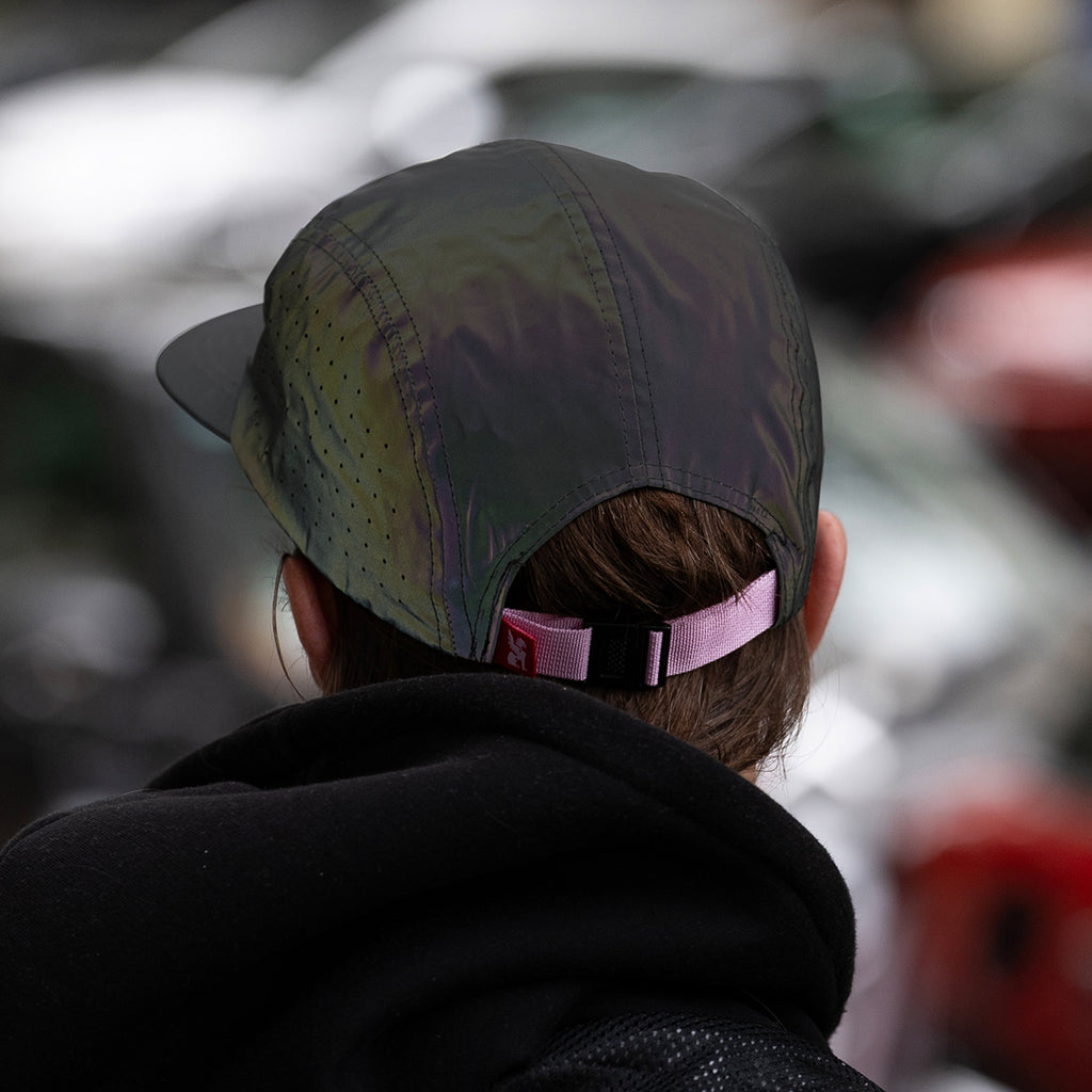 details from the back of a cap with pink attachment