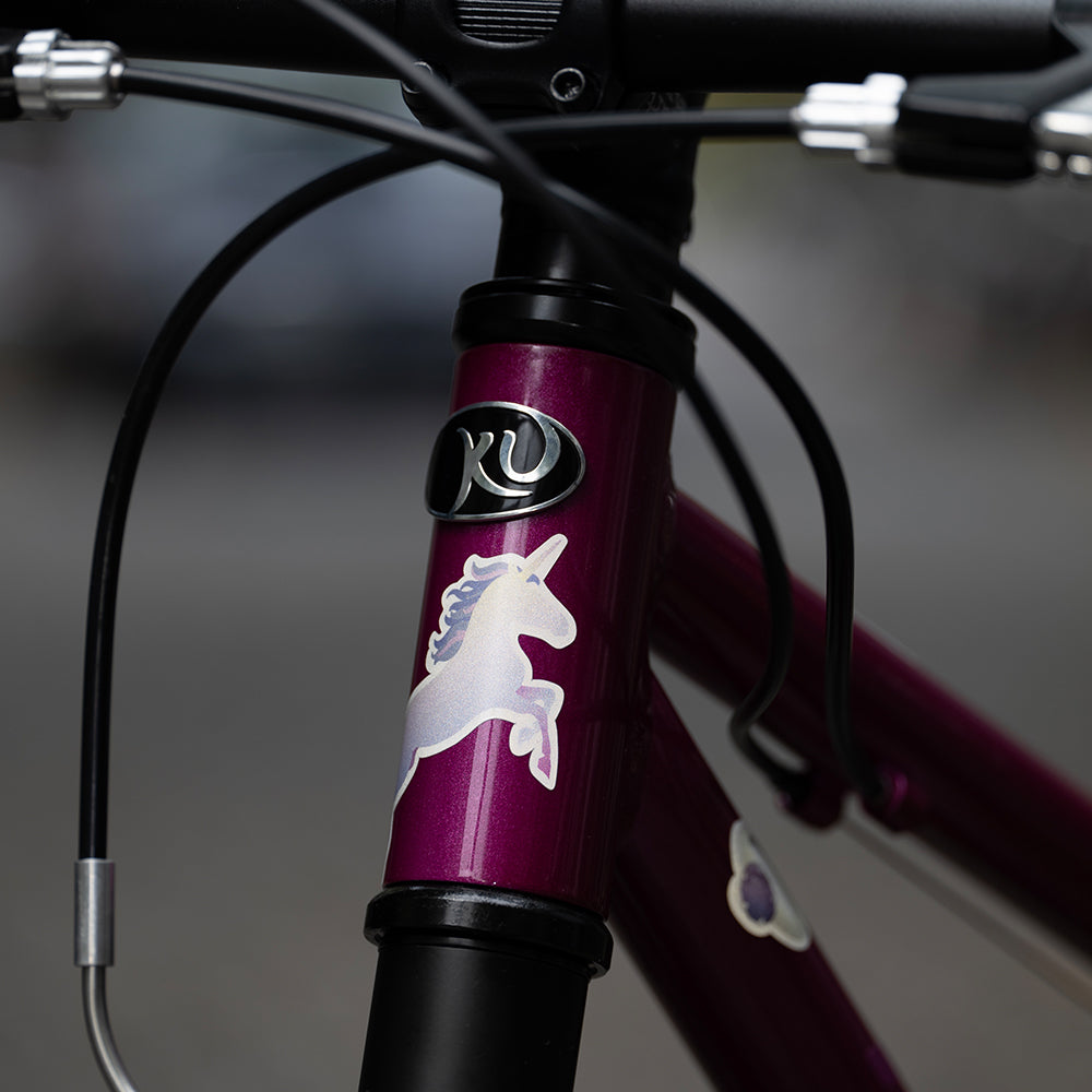 Close up of a front purple bicycle