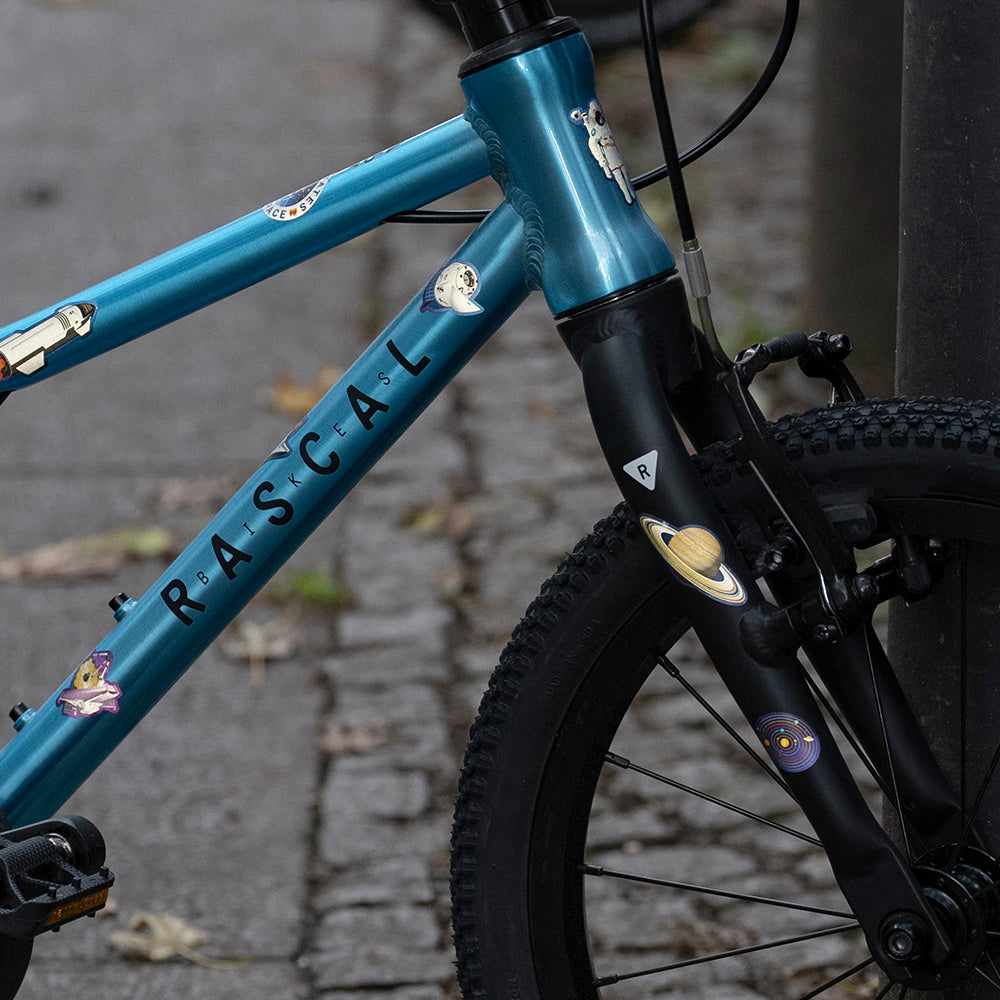 Close up of a blue bicycle with space reflective stickers