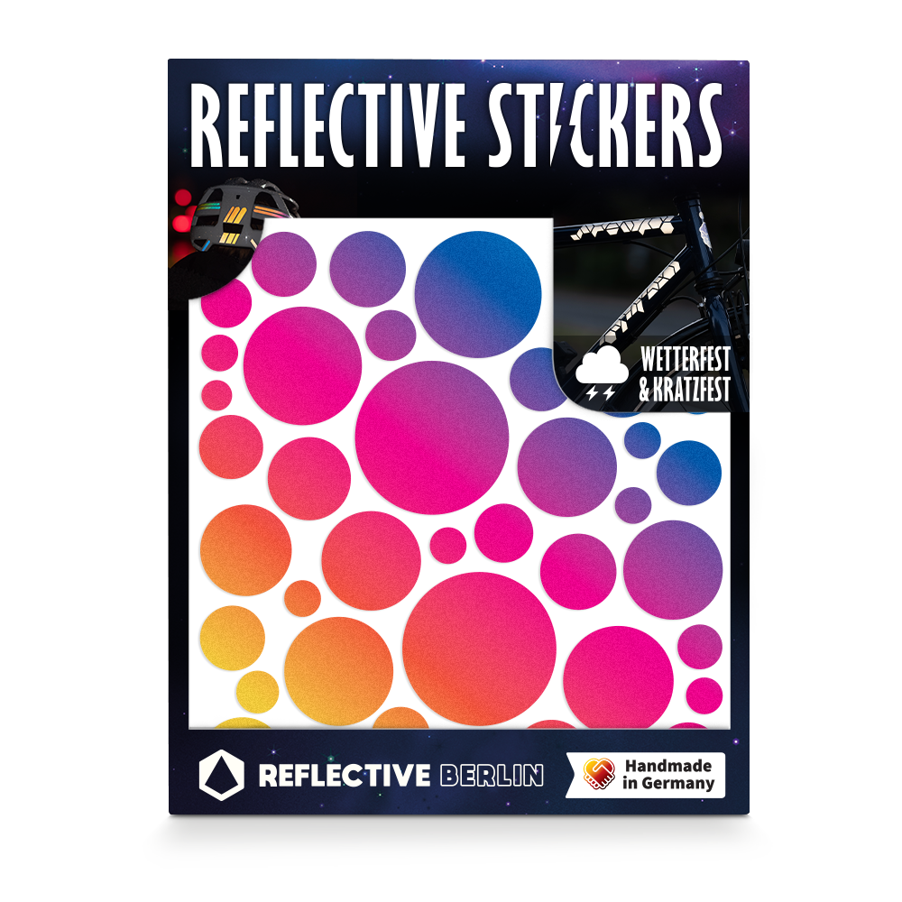 M Bubbles in Rainbow-Farbe von REFLECTIVE Berlin als verpacktes Set mit stark reflektierenden bunten Kreisen für mehr Sichtbarkeit im urbanen Stil.