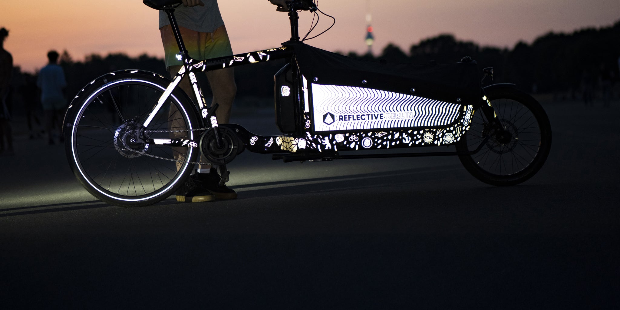 Reflective bullit bicycle with berlin background