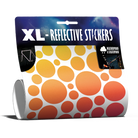 XL Bubbles in Rainbow-Farbe von REFLECTIVE Berlin als verpacktes Set mit stark reflektierenden bunten Kreisen für mehr Sichtbarkeit im urbanen Stil.