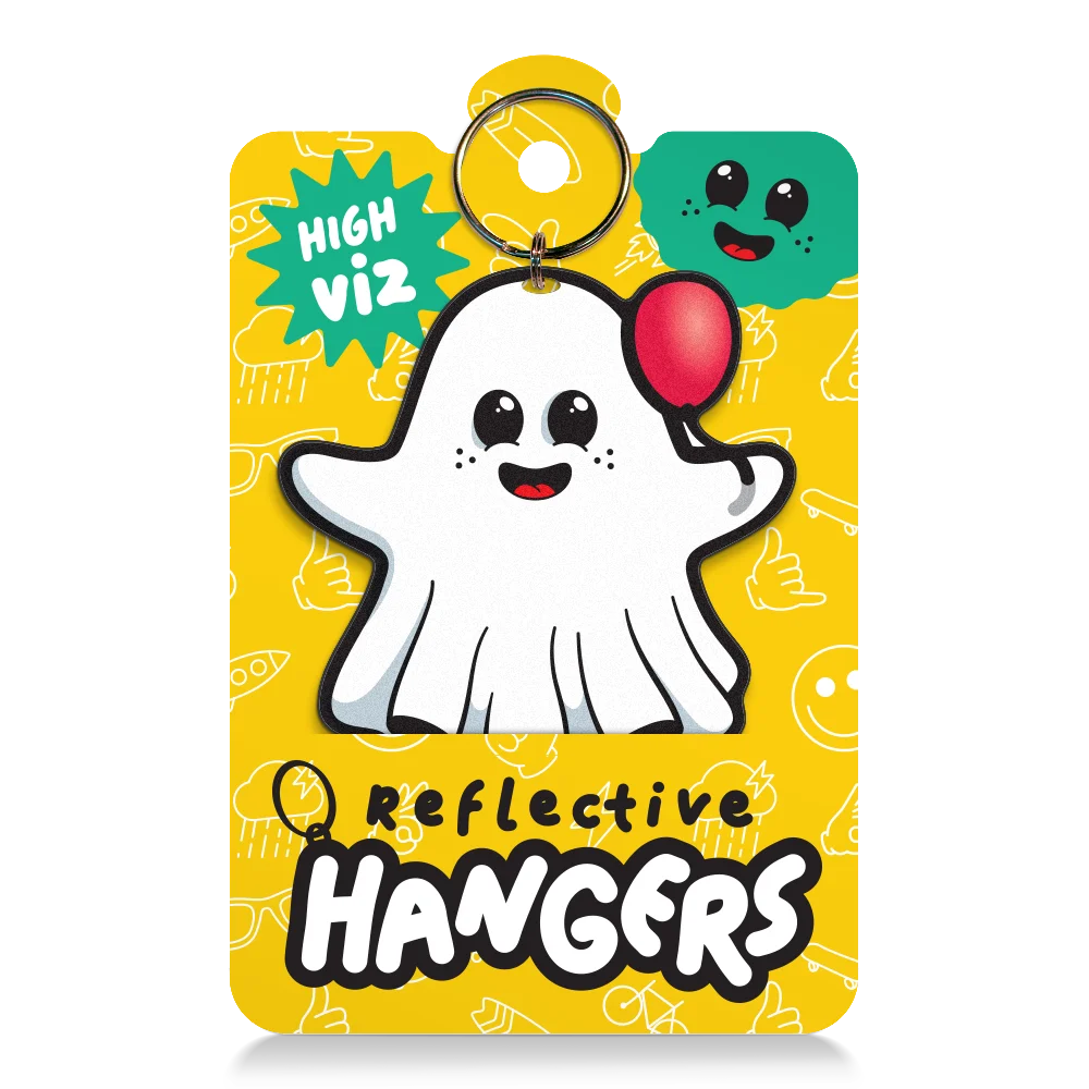 Reflektierender Anhänger ‚Reflective Hangers‘  in der Variante ‚Buster’. Der Anhänger sieht wie ein Geist aus mit Luftballon in der Hand und ist in Produktverpackung von REFLECTIVE Berlin abgebildet.