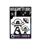 Reflektierender Aufkleber „UFO“ in Farbvariante „schwarz“ in Produktverpackung von REFLECTIVE Berlin.