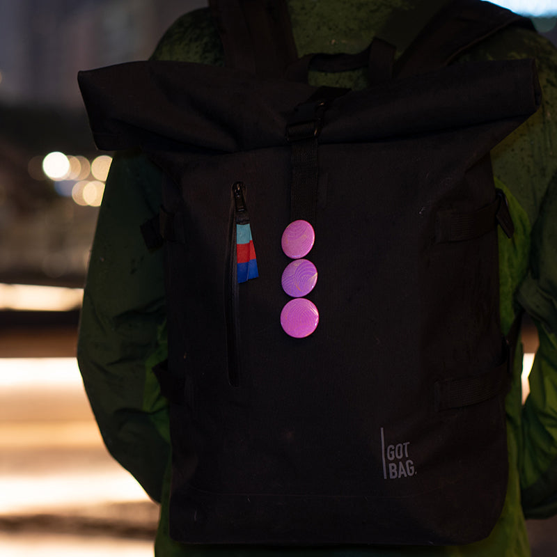Pink reflective buttons on GOT Bag
