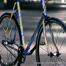 Blue bike with colourful reflective stickers