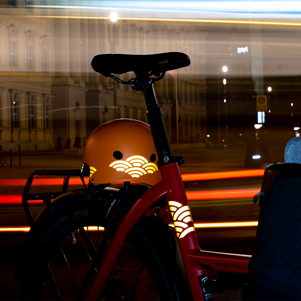 reflective cargo mini reflective sticker on bike at night with blurry background