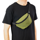 man wearing olive reflective pouchpouch