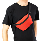 Man wearing red tomato reflective pouch