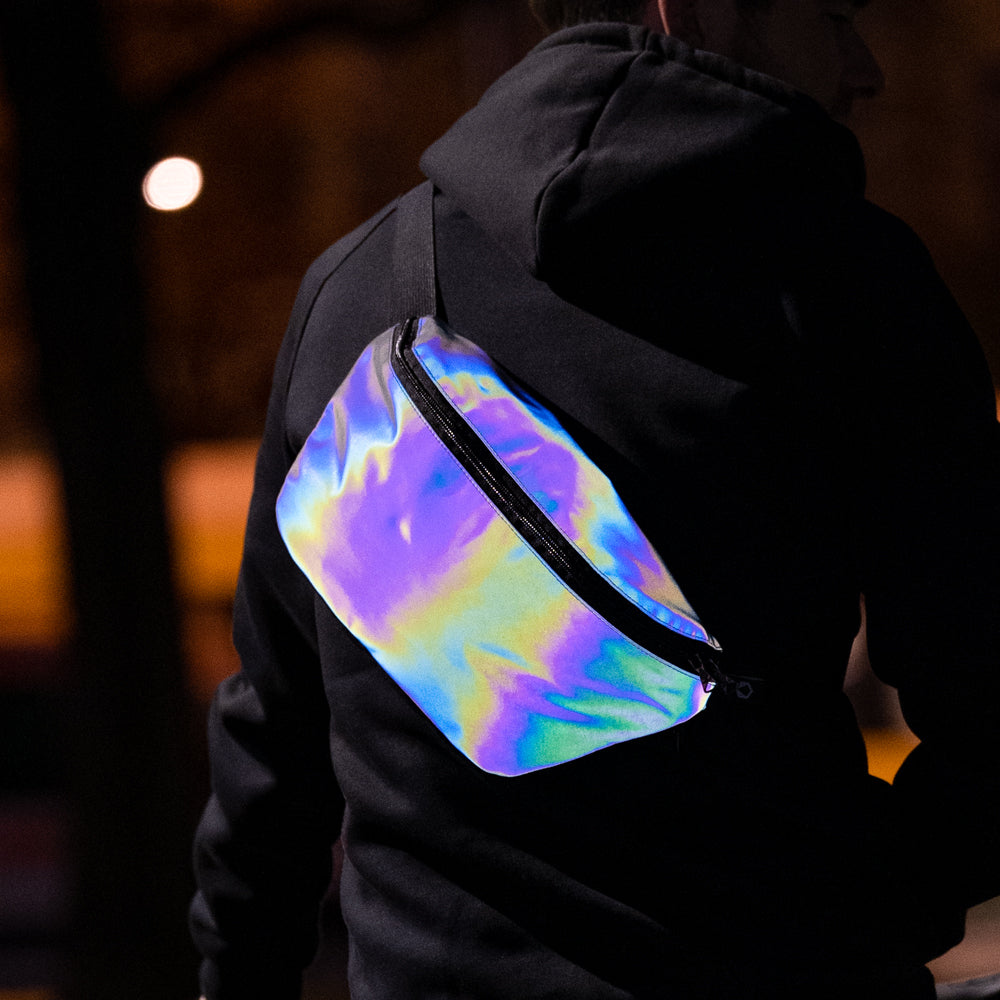 Man wearing the XL rainbow reflective pouch.