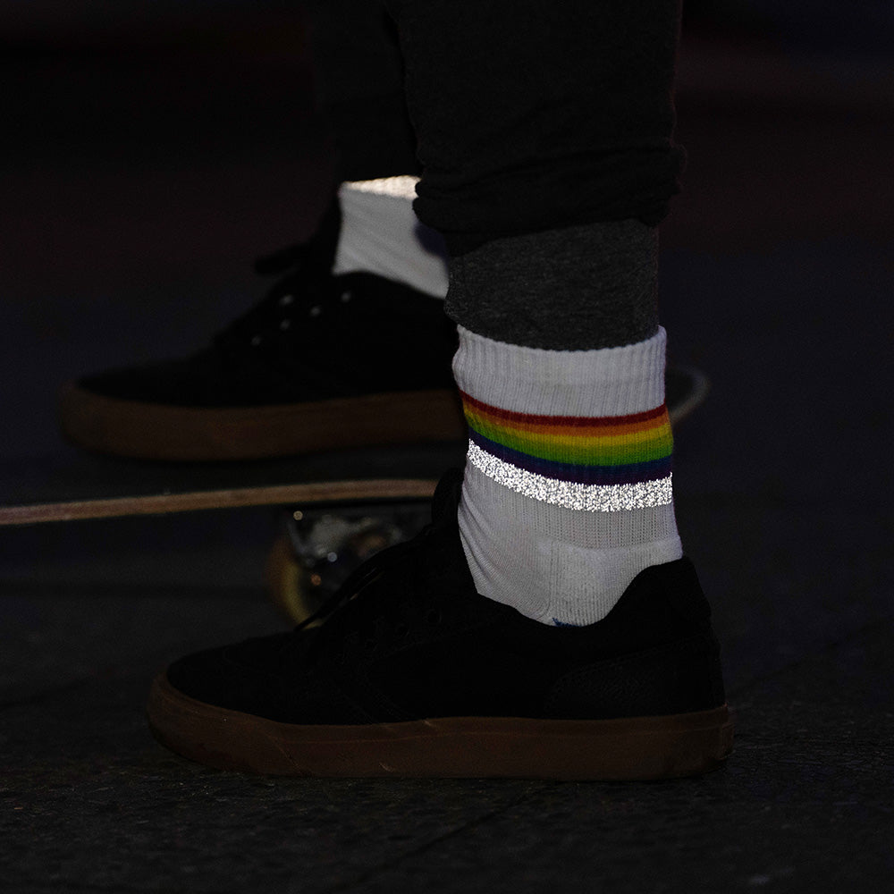 Rainbow white reflective socks with skateboard at night